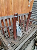 A pair of saddle racks with tack brackets, by Musgrave and Co, Belfast & London.