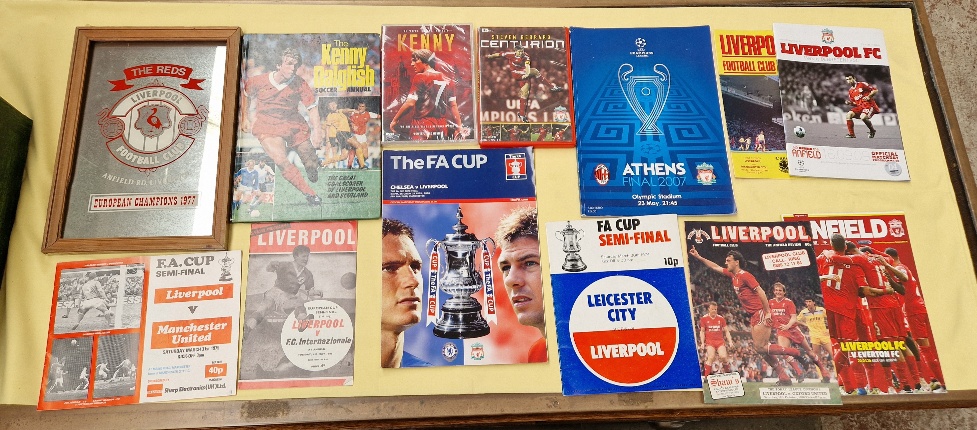 A box of Liverpool FCmemorabilia to include t-shirt, flags, figure, mirror, annuals, dvds, vhs... - Image 2 of 4