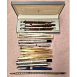 A mixed lot of pens including Parker and Shaeffer, one having 14 carat gold nib.