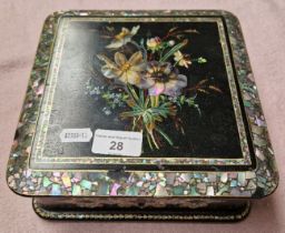 A Victorian black lacquer and mother of pearl inlaid jewellery box with quilted interior and