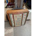 Six framed sets of cigarette cards together with an early 20th century framed photographic print.