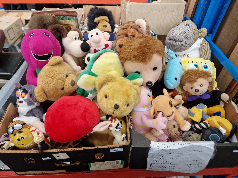 Two boxes of assorted soft toys.