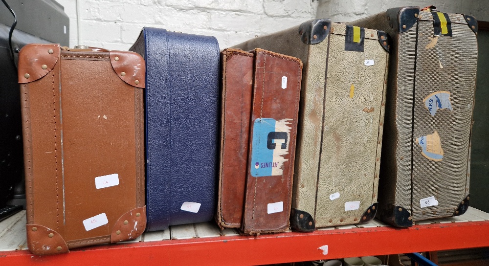 5 vintage suitcases