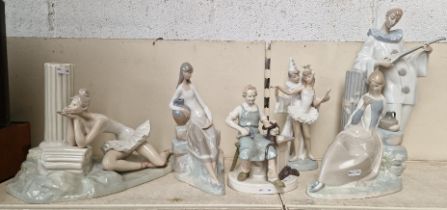 A group of six Lladro, Nao and similar figures.