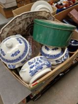 A box of assorted pottery, tins, Wedgwood platter, Churchill etc.