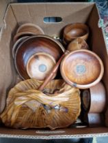 A box of treen including Bermuda coin inset cedar dishes.