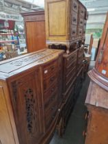 Various items of carved wood furniture including dressing table, side cabinet, four chest of drawers