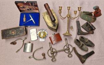 A flat iron, child's shoe last, clogs, hip flasks, AA badge, coal iron, brass stirrups etc