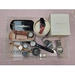 A box of ladies and gents watches including Fossil and Radley.