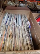 A box of mixed soul, rock & pop 7" vinyl singles.
