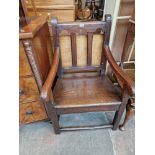 A 17th Century pitch pine armchair