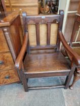 A 17th Century pitch pine armchair