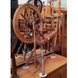 An oak spinning wheel.