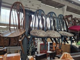 Three painted Ercol swan back dining chairs and one other unpainted.