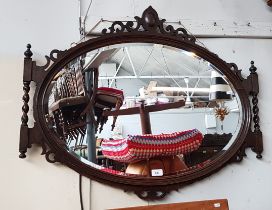 A 1920s oak framed mirror