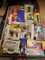 A crate of boxed model cars including Corgi, Matchbox, Lledo etc