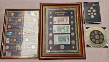 Two framed displays of coins and notes and two uncirculated coin sets.