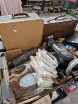 A group of vintage items to include a Singer sewing machine, typewriter with spare reels,