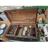 A wooden tool chest and contents.