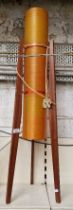 A mid century rocket lamp, teak legs, acrylic shade, 110cm height.