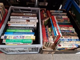 A box of children's books and box of antiques and collector's guide books.