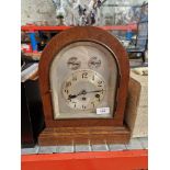 A steel dial mantle clock.