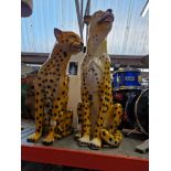 Two resin cheetah animal figures, height 73cm and 56cm.