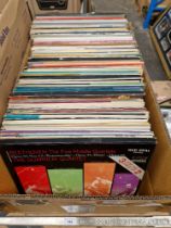 A box of classical vinyl LP records.