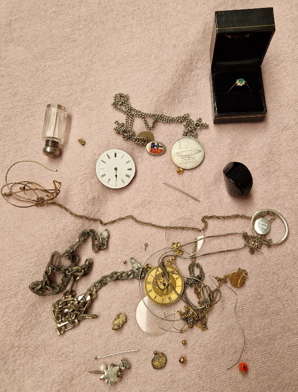 Bag of watch parts and a ring