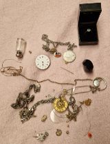 Bag of watch parts and a ring