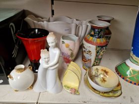 A group of assorted ceramics to include a Sylvac wild horses vase, Moments sisterly love figure,