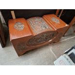 An Eastern carved camphor wood chest.