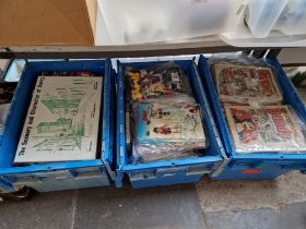 Three large boxes of books, annuals and comics.
