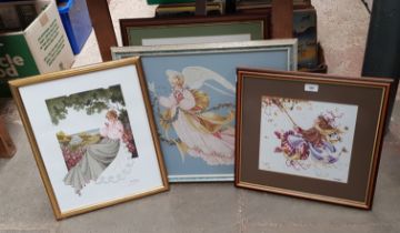 Five framed needlework pictures.