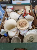 A box of assorted collectable ceramics to include a Guinness ashtray, wooden vesta, Sicilian etc.