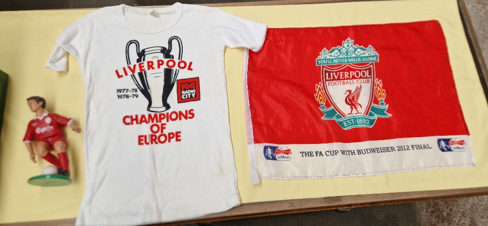 A box of Liverpool FCmemorabilia to include t-shirt, flags, figure, mirror, annuals, dvds, vhs... - Image 4 of 4