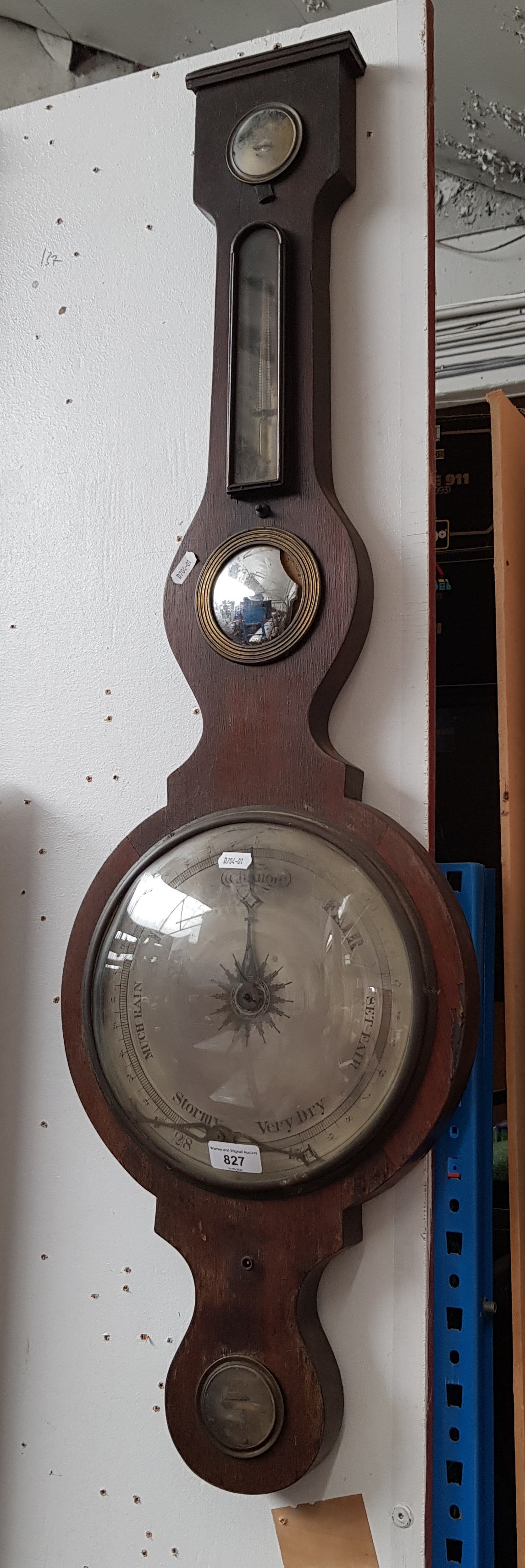 A banjo barometer with thermometer and convex mirror (as found).