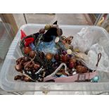 A box of assorted costume jewellery.