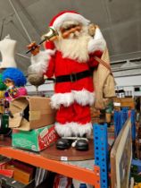 A large Father Christmas automaton.