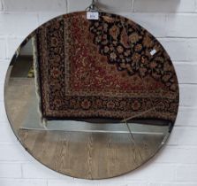 A 1930s Art Deco etched glass wall mirror, diameter 66cm.