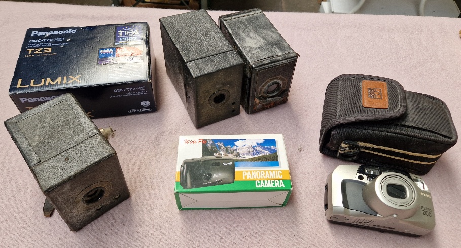 5 vintage and modern cameras and some Lumix accessories