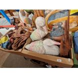 Two boxes of mainly carved wooden animal figures.