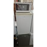 A Fridgidaire freezer, a Cookworks microwave and a Logik freezer.