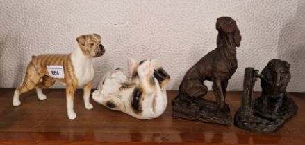 A group of figures to include a Beswick boxer, Goebel cat and Heredities.