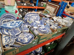 Four boxes of assorted blue and white pottery.