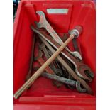 A red box of assorted heavy duty spanners and a boring tool