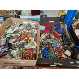 A boxed of mixed costume jewellery, badges and magnets.