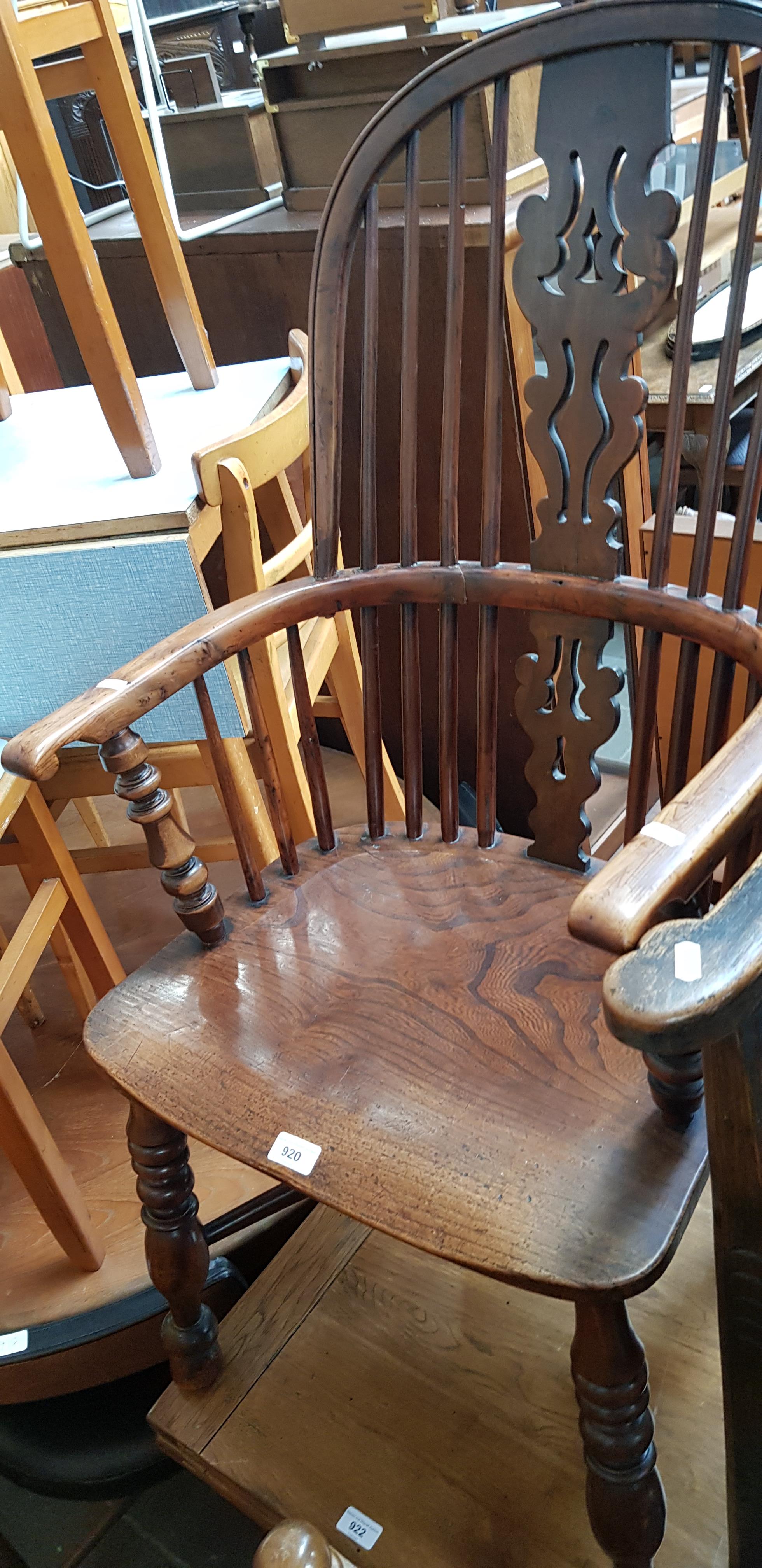 A 19th century elm and yew wood Windsor chair.