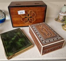 Two wooden boxes and a vintage cigarette case.