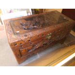 A carved eastern chest.